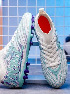 High-top fly-knit soccer cleats for kids and adults in stylish white and blue colors