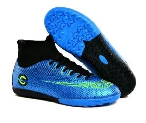 Blue and black high-top football boots with lime green accents and rubber turf sole
