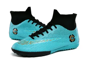 Detail of high-top turquoise soccer shoes with breathable mesh and turf cleats.