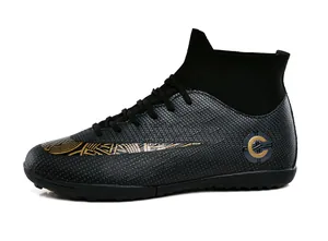 Professional high-top black and gold soccer shoes for youth outdoor football training sessions