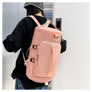 Pink multi-functional travel backpack for fitness and sports shown on model