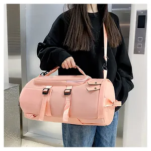 Pink multi-functional travel duffel bag for gym, sports, and short weekend trips.