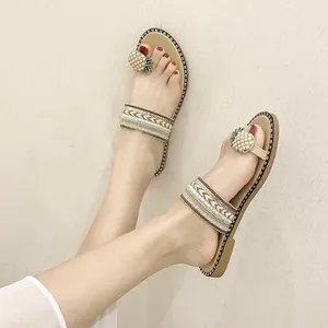 Boho flat sandals for women featuring pineapple pearl decor and ethnic braided straps