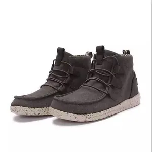Side view of grey casual low-top women's flat short boots with speckled soles.