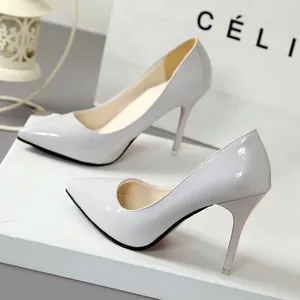 Elegant grey patent leather pointed toe stiletto pumps for professional and party wear