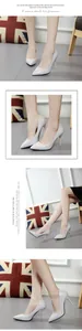 Detailed view of pointed-toe stiletto pumps in glossy light grey finish