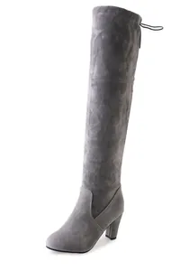 Elegant grey suede over-the-knee boots with chunky high heels and drawstring detail