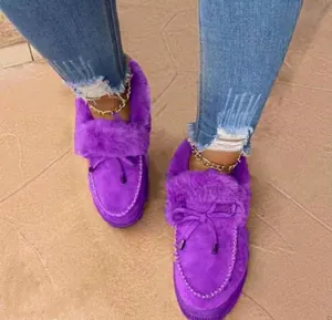 Warm purple winter loafers for women featuring plush lining and a thick durable sole