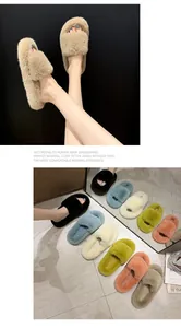 Plush faux fur open-toe flat slides in various colors for cozy indoor and outdoor wear.