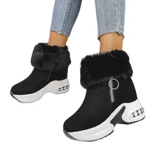 Women's black winter snow boots featuring warm fur trim and thick platform wedge soles
