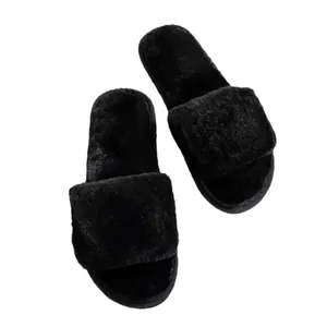 Luxury soft black faux fur slide slippers with plush sole and open toe design for home
