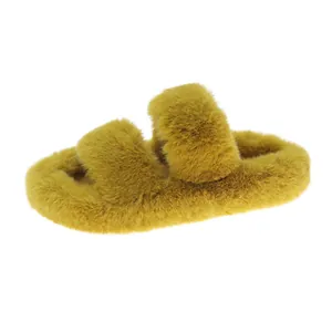Cozy mustard yellow faux fur double-strap slippers featuring a thick sole and open-toe design.