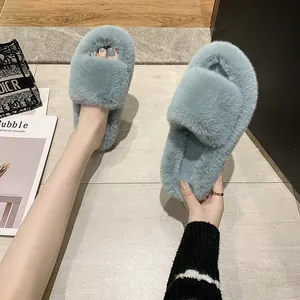 Comfortable blue-grey faux fur slippers with flat soles for indoor and outdoor wear