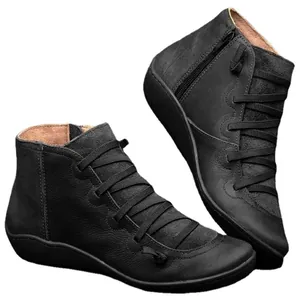 Bottines Martin noires plates pour femmes avec lacets et fermeture éclair