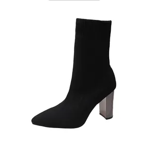 Botines de calcetín de punto negro con tacón grueso galvanizado y punta afilada