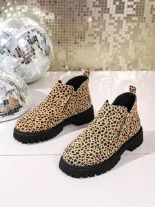 Fashionable leopard print women's Chelsea boots featuring side zipper and chunky sole
