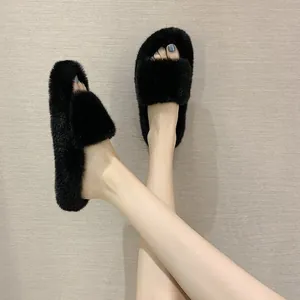 Elegant black faux fur platform slide slippers for women featuring soft open-toe design