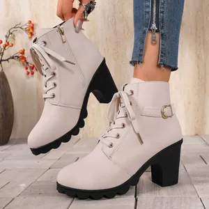 Elegant beige women's block heel combat boots with side zipper and lace-up details