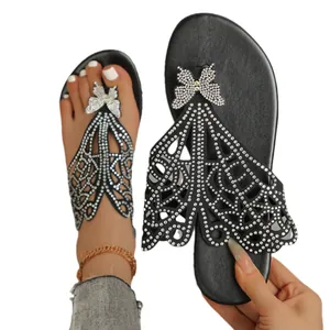Eleganti sandali infradito neri da donna con decorazione a farfalla in strass traforati