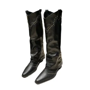 Chic black knee-high Western cowboy boots featuring vintage rivet studs and pointy toe design.