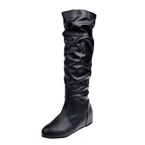 Classic black slouched knee-high boots featuring soft faux leather and a comfortable flat sole