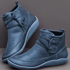 Bottines plates en cuir bleu rétro avec lanières et boutons décoratifs uniques