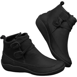 Women's black leather flat ankle boots with stylish buckle strap details and soft sole