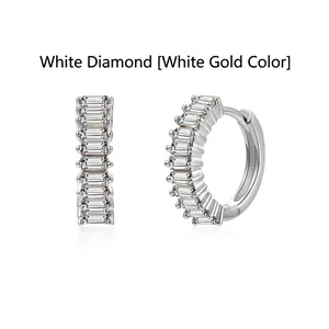 Elegant white gold hoop earrings featuring sparkling baguette-cut cubic zirconia