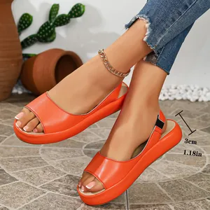 Detail view showing the 3cm platform heel height of stylish orange fish-mouth summer sandals