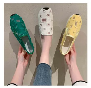 Distressed canvas slip-on sneakers for women in green, white, and yellow colors.