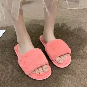 Stylish soft pink furry slide slippers for women, perfect for comfortable indoor wear