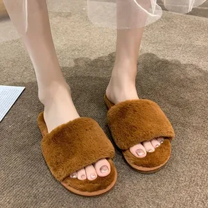 Warm brown faux fur open-toe slippers for women displayed on a cozy indoor carpet