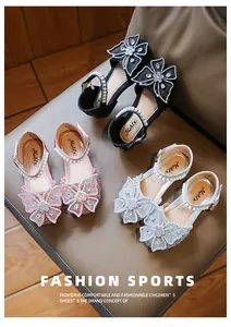 Elegant girls' glitter sandals with large butterfly bows and pearl ankle straps