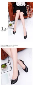 Detailed shot of elegant black professional low-heel round-toe pumps for women