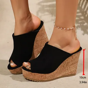 Side view of women's peep-toe wedge sandals showing 10cm cork platform heel