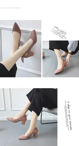 Close-up detail of mauve pointed toe pumps featuring chunky heels and bow accents