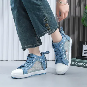 Close-up detail of women's breathable high-top sneakers with lace mesh and blue denim