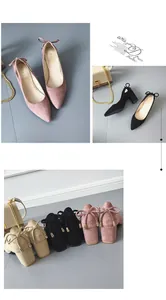 Detail of suede pumps with pointed toe and bow-knot chunky heels in multiple colors