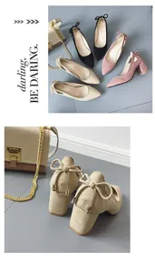 Detail view of women's suede chunky heel pumps featuring elegant bow decoration on the back