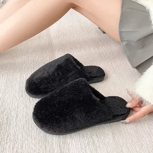 Premium cozy black faux fur slippers for women, perfect for stylish home and office wear.