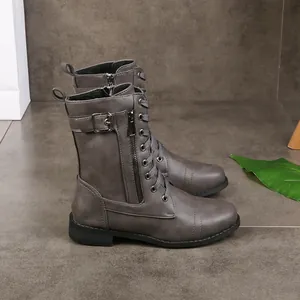 Detailed side view of grey round-toe lace-up Martin boots with side zipper and buckle