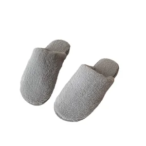 Soft grey fuzzy closed-toe indoor slippers for women, ideal for home and office comfort.