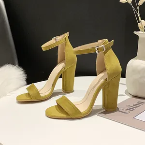 Fashionable mustard yellow suede chunky high heel sandals with adjustable ankle strap
