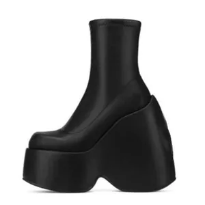 Women's black platform wedge ankle boots with a trendy square toe and stretch fit