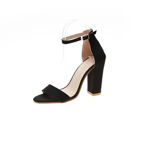 Side view of black chunky heel sandals with suede finish and ankle strap