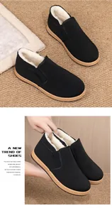 Detail of warm black fleece-lined loafers with non-slip sole for winter comfort.