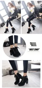Detailed macro view of women's black chunky high-heel lace-up platform ankle boots