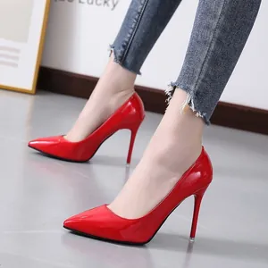 Elegant red patent leather pointed-toe stiletto high heels for women, chic evening pumps.