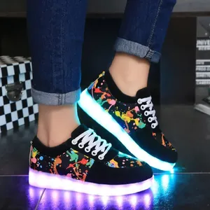 Vibrant LED light-up sneakers with colorful graffiti pattern and USB charging port