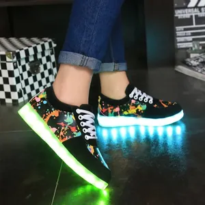 Detailed view of LED glowing graffiti sneakers with colorful USB rechargeable light
